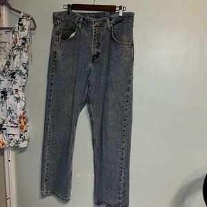 Wrangler Vintage boot cut 34X 30 100% cotton some damage on the back bottom legs